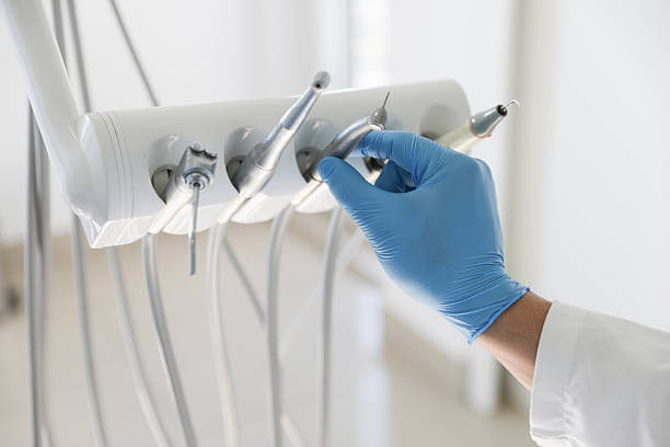 Professional Tooth Extraction technician working in Catlin, IL